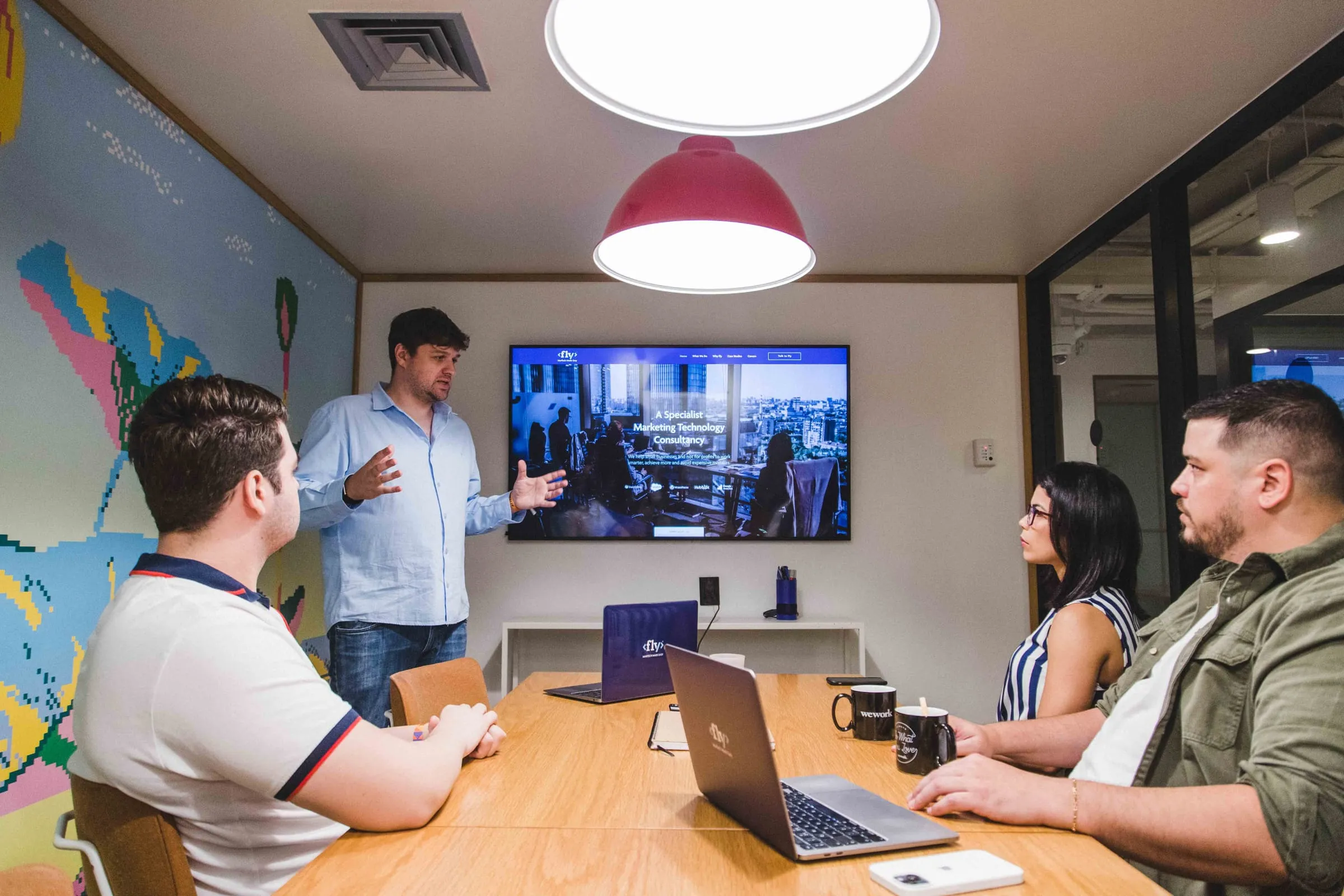 Fly team collaborating in the office